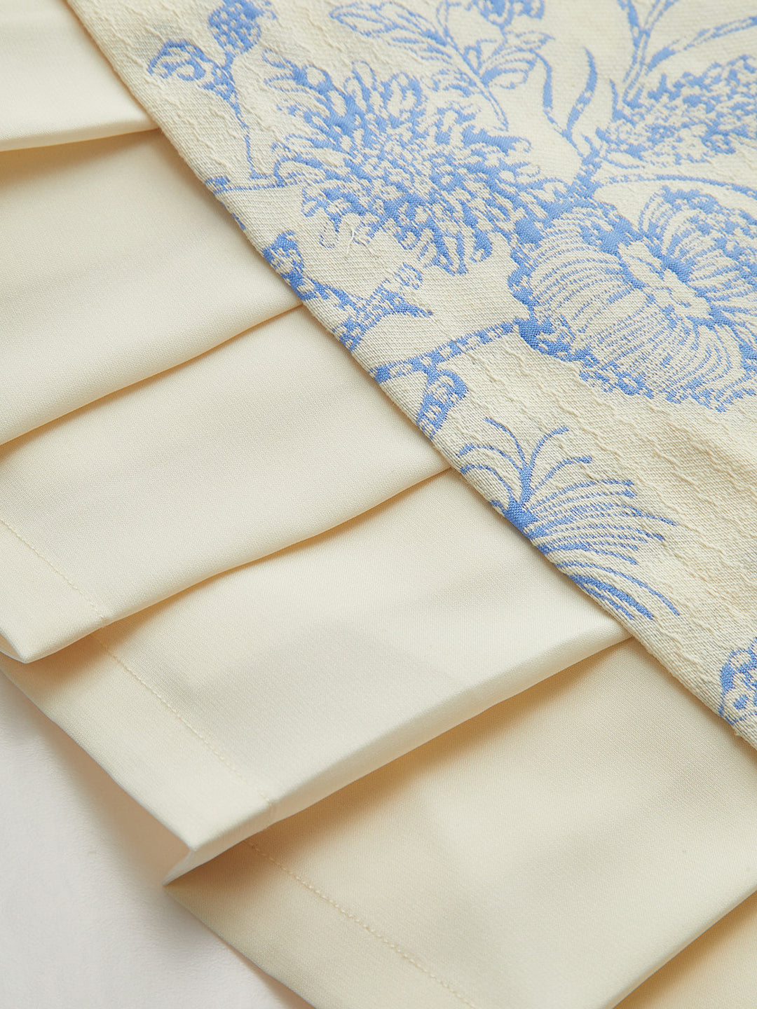 Floral Printed Sleeveless Dress with Pleated Hem